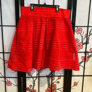 Vibrant red   Right above the knee